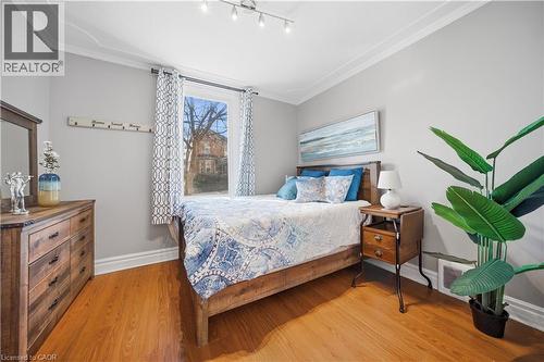 Main Floor Bedroom. Main Floor, High Ceilings with Decorative Molding, Double Entry Doors - 107 Queen Street S, Hamilton, ON - Indoor Photo Showing Bedroom