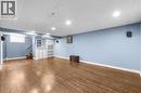Basement with stairway, dark wood-style flooring, a drop ceiling, and recessed lighting - 368 Upper Kenilworth Avenue, Hamilton, ON  - Indoor Photo Showing Basement 