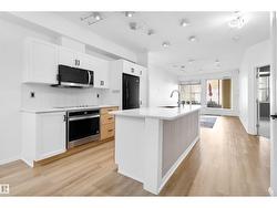 #110 9804 101 ST NW  Edmonton, AB T5K 2X3