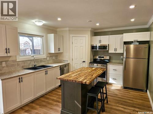 20 Centennial Drive, Mossbank, SK - Indoor Photo Showing Kitchen With Double Sink