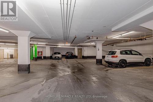 1403 - 4850 Glen Erin Drive, Mississauga, ON - Indoor Photo Showing Garage
