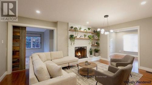 4240 Dunvegan Road, Burlington, ON - Indoor Photo Showing Living Room With Fireplace