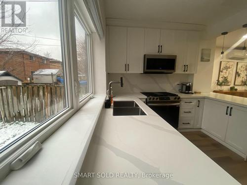 42 Arnold Avenue, Toronto, ON - Indoor Photo Showing Kitchen With Double Sink