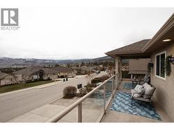 Front patio with lake views that expands the width of the front house with gas hook up - 