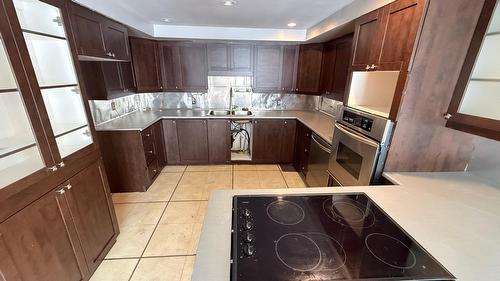 Cuisine - 11373 Rue Victoria, Montréal-Est, QC - Indoor Photo Showing Kitchen With Double Sink