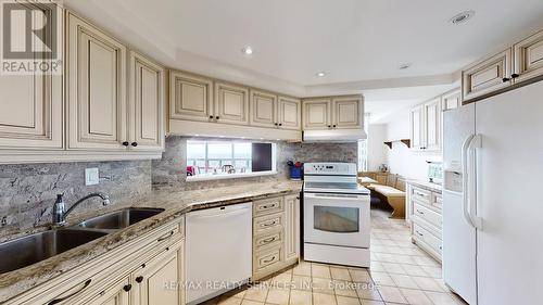909 - 330 Mill Street S, Brampton, ON - Indoor Photo Showing Kitchen With Double Sink