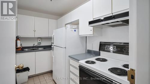 909 - 330 Mill Street S, Brampton, ON - Indoor Photo Showing Kitchen With Double Sink