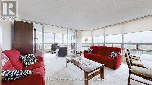 909 - 330 Mill Street S, Brampton, ON - Indoor Photo Showing Living Room