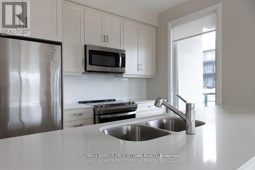 105 - 130 Boundstone Way, Ottawa, ON - Indoor Photo Showing Kitchen With Double Sink