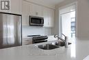 105 - 130 Boundstone Way, Ottawa, ON  - Indoor Photo Showing Kitchen With Double Sink 