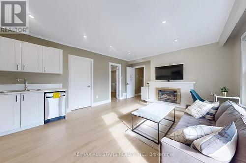 105 Betty Ann Drive, Toronto, ON - Indoor Photo Showing Living Room With Fireplace