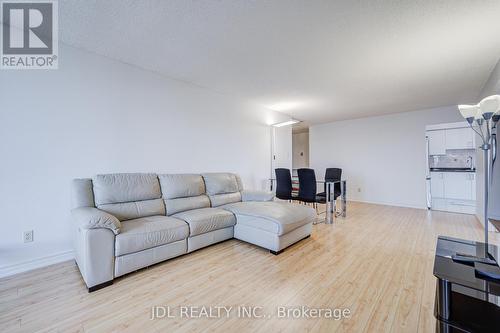 1106 - 1 Reidmount Avenue, Toronto, ON - Indoor Photo Showing Living Room