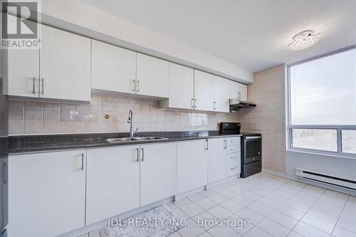 1106 - 1 Reidmount Avenue, Toronto, ON - Indoor Photo Showing Kitchen With Double Sink