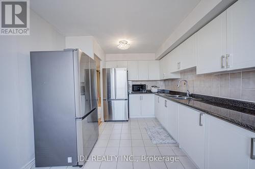 1106 - 1 Reidmount Avenue, Toronto, ON - Indoor Photo Showing Kitchen With Double Sink