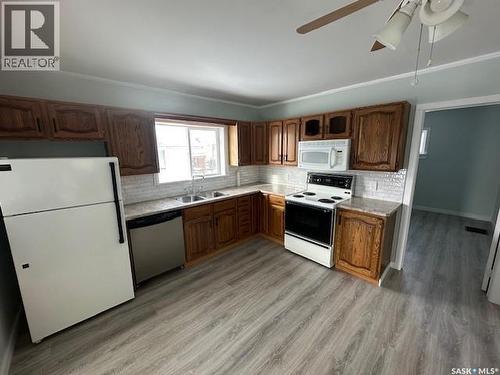 113 Railway Avenue, Richmound, SK - Indoor Photo Showing Kitchen With Double Sink