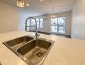 Cuisine - 201-3791 Rue De Mont-Royal, Longueuil (Saint-Hubert), QC  - Indoor Photo Showing Kitchen With Double Sink 