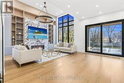 Family Room w/large window and built-in TV wall - 