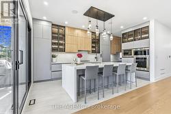 Kitchen W/ Custom Cabinetry and appliances - 