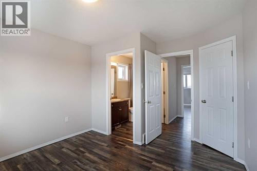 Top Floor - Primary Bedroom - 322 17 Street E, Brooks, AB - Indoor Photo Showing Other Room