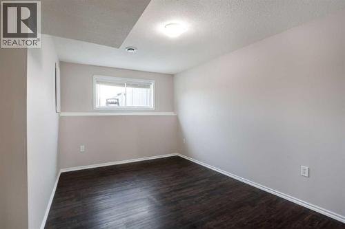 Basement Family Room - 322 17 Street E, Brooks, AB - Indoor Photo Showing Other Room