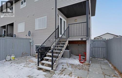 Covered Back Deck - A/C under deck - 322 17 Street E, Brooks, AB - Outdoor