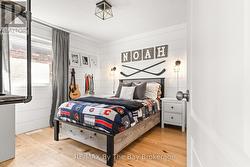Bedroom - knotty pine shiplap - 