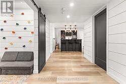 Rock climbing wall in play room - 