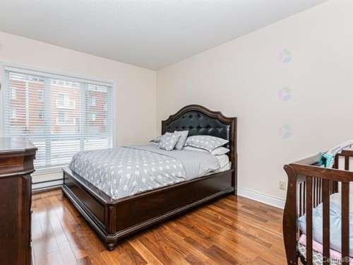 Primary bedroom - 105-150 Rue Barnett, Dollard-Des-Ormeaux, QC - Indoor Photo Showing Bedroom