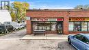 View of commercial property featuring uncovered parking - 223 Louisa Street, Kitchener, ON 