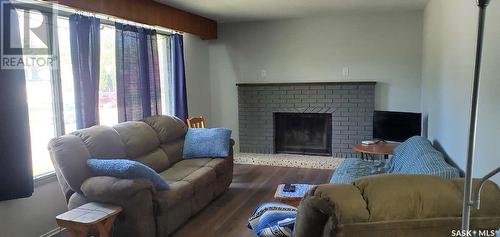 1491 112Th Street, North Battleford, SK - Indoor Photo Showing Living Room With Fireplace