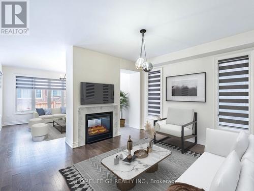 8 Vetch Street, Brampton, ON - Indoor Photo Showing Living Room With Fireplace