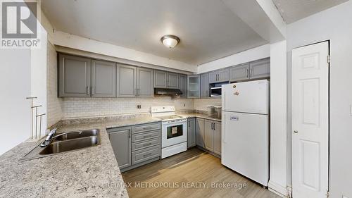 18 - 11 Livonia Place, Toronto, ON - Indoor Photo Showing Kitchen With Double Sink