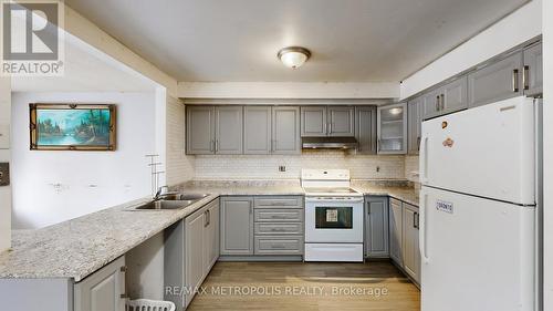 18 - 11 Livonia Place, Toronto, ON - Indoor Photo Showing Kitchen With Double Sink