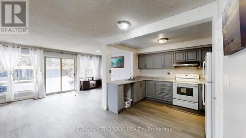 18 - 11 Livonia Place, Toronto, ON - Indoor Photo Showing Kitchen With Double Sink