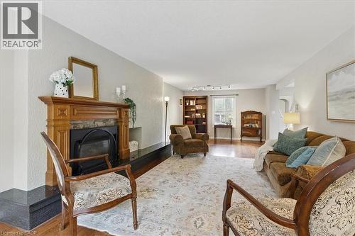 348 Old Stone Road, Waterloo, ON - Indoor Photo Showing Living Room With Fireplace