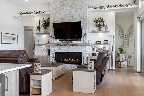 2202 Tramonto Court, Kelowna, BC - Indoor Photo Showing Living Room With Fireplace