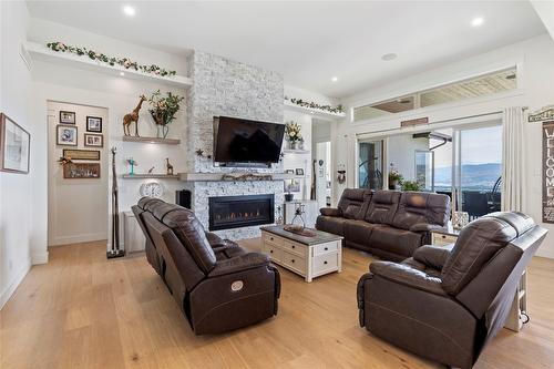 2202 Tramonto Court, Kelowna, BC - Indoor Photo Showing Living Room With Fireplace