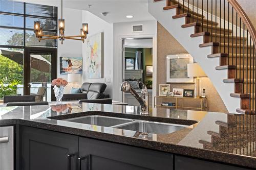 205-600 Sarsons Road, Kelowna, BC - Indoor Photo Showing Kitchen With Double Sink