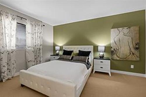 205-600 Sarsons Road, Kelowna, BC - Indoor Photo Showing Bedroom