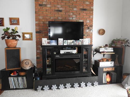 43 Sigalet Road, Lumby, BC - Indoor With Fireplace