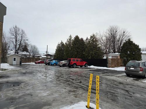 Stationnement - 1-2265 Av. Auguste, Brossard, QC - Outdoor