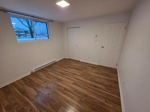 Chambre à coucher principale - 1-2265 Av. Auguste, Brossard, QC - Indoor Photo Showing Other Room