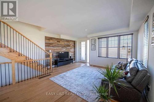 49 Prince William Boulevard, Clarington, ON - Indoor Photo Showing Living Room With Fireplace