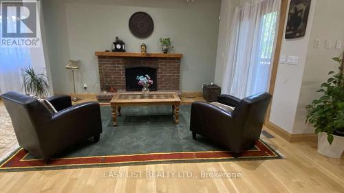 98 Burbank Drive, Toronto, ON - Indoor Photo Showing Living Room With Fireplace
