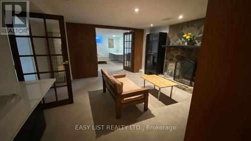 98 Burbank Drive, Toronto, ON - Indoor Photo Showing Other Room With Fireplace