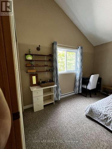 2135 Champlain Road, Tiny, ON - Indoor Photo Showing Bedroom