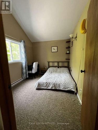 2135 Champlain Road, Tiny, ON - Indoor Photo Showing Bedroom