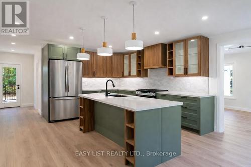 14 Eagle Road, Tiny, ON - Indoor Photo Showing Kitchen With Upgraded Kitchen
