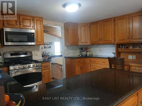 7652 Harris Point Drive, Plympton-Wyoming, ON - Indoor Photo Showing Kitchen