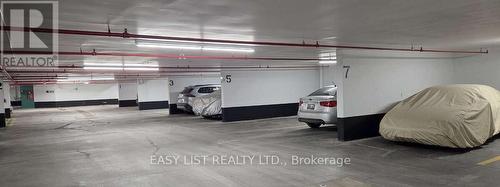 203 - 155 Main Street N, Newmarket, ON - Indoor Photo Showing Garage